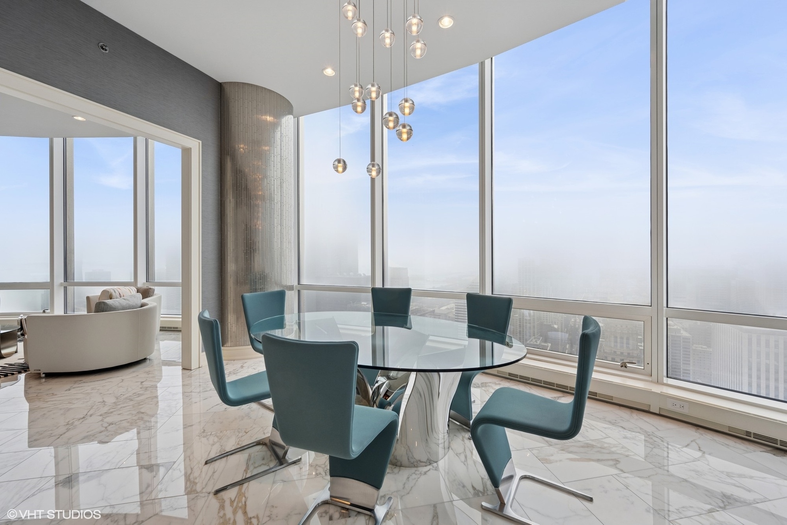 401 North Wabash Avenue, Unit 49G Chicago, IL 60611 - Photo 32 of 60 a dining room with furniture and a large window