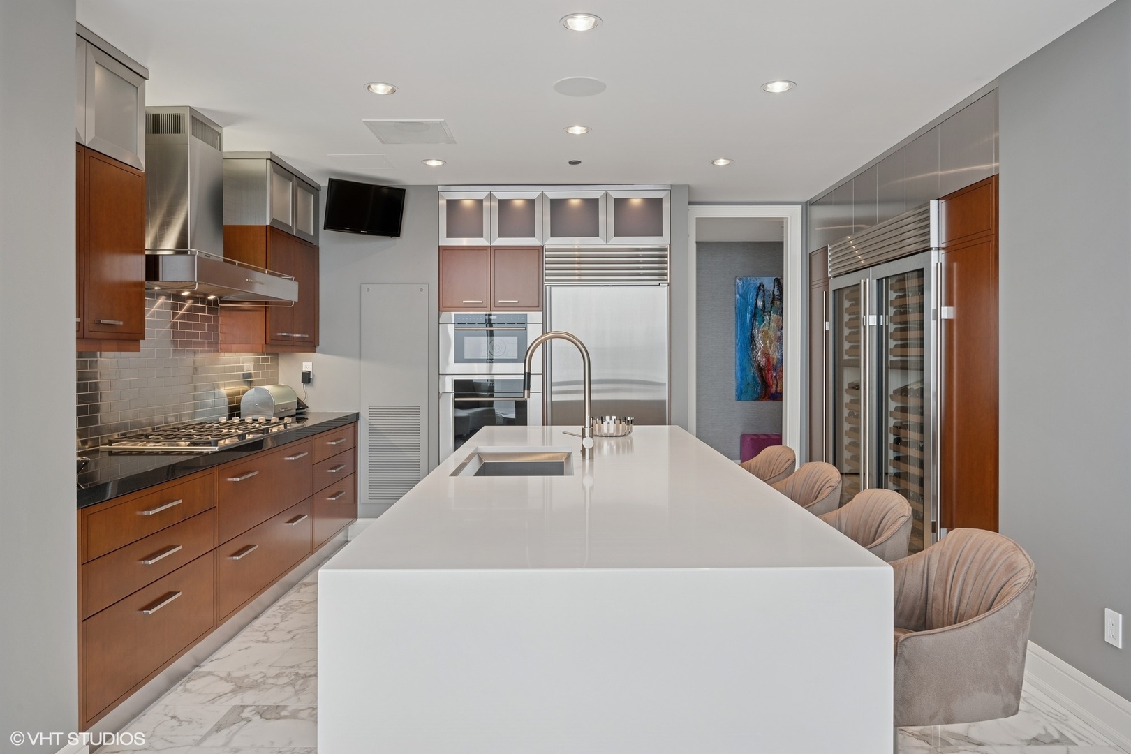 401 North Wabash Avenue, Unit 49G Chicago, IL 60611 - Photo 33 of 60 a large white kitchen with cabinets a sink and a stove