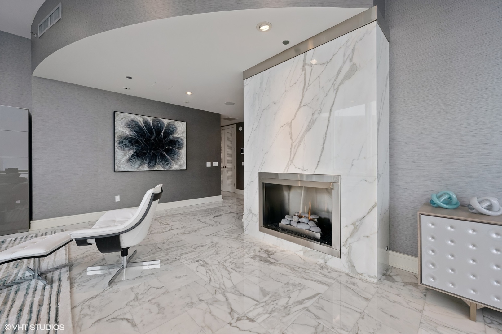 401 North Wabash Avenue, Unit 49G Chicago, IL 60611 - Photo 38 of 60 a living room with furniture and a fireplace