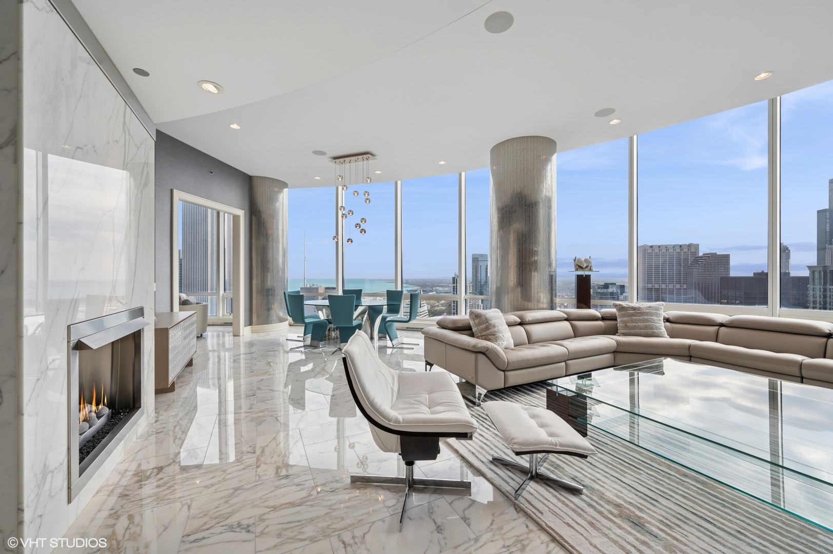 401 North Wabash Avenue, Unit 49G Chicago, IL 60611 - Photo 5 of 60 a living room with fireplace furniture and a rug