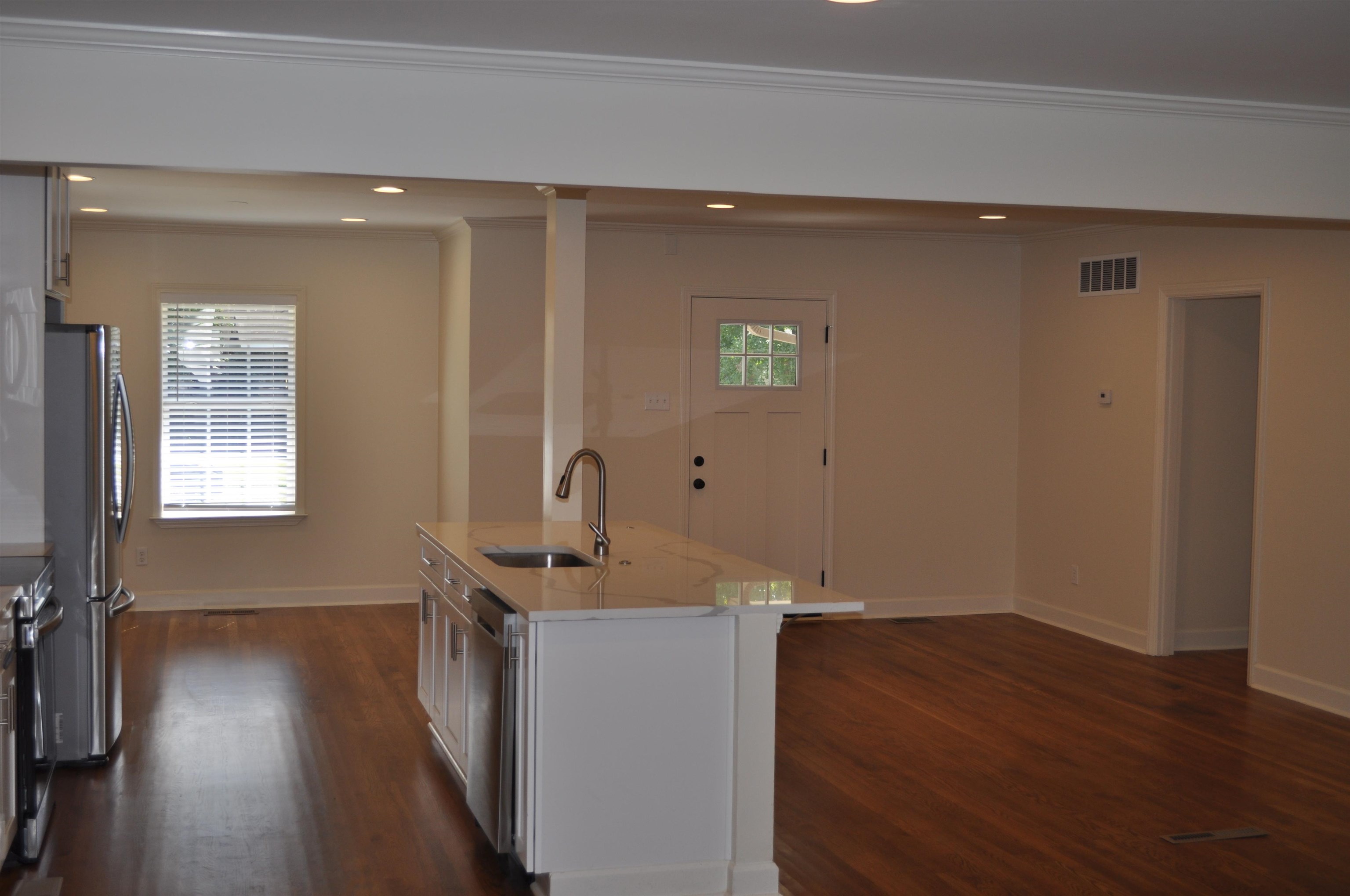5016 Princeton Road Memphis, TN 38117 - Photo 10 of 20 a view of a livingroom with wooden floor and a sink