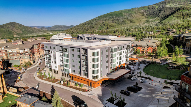 2417 West High Road, Unit 2515 Park City, UT 84098 - Photo 46 of 67 Aerial view of a mountainous background and apartment complex / building