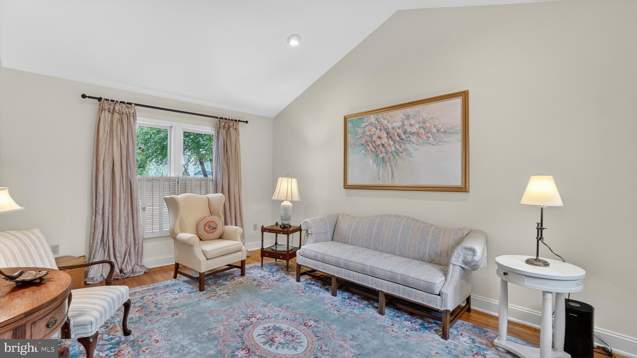 317 Canterfield Road Annapolis, MD 21403 - Photo 7 of 66 a living room with furniture a lamp and a window