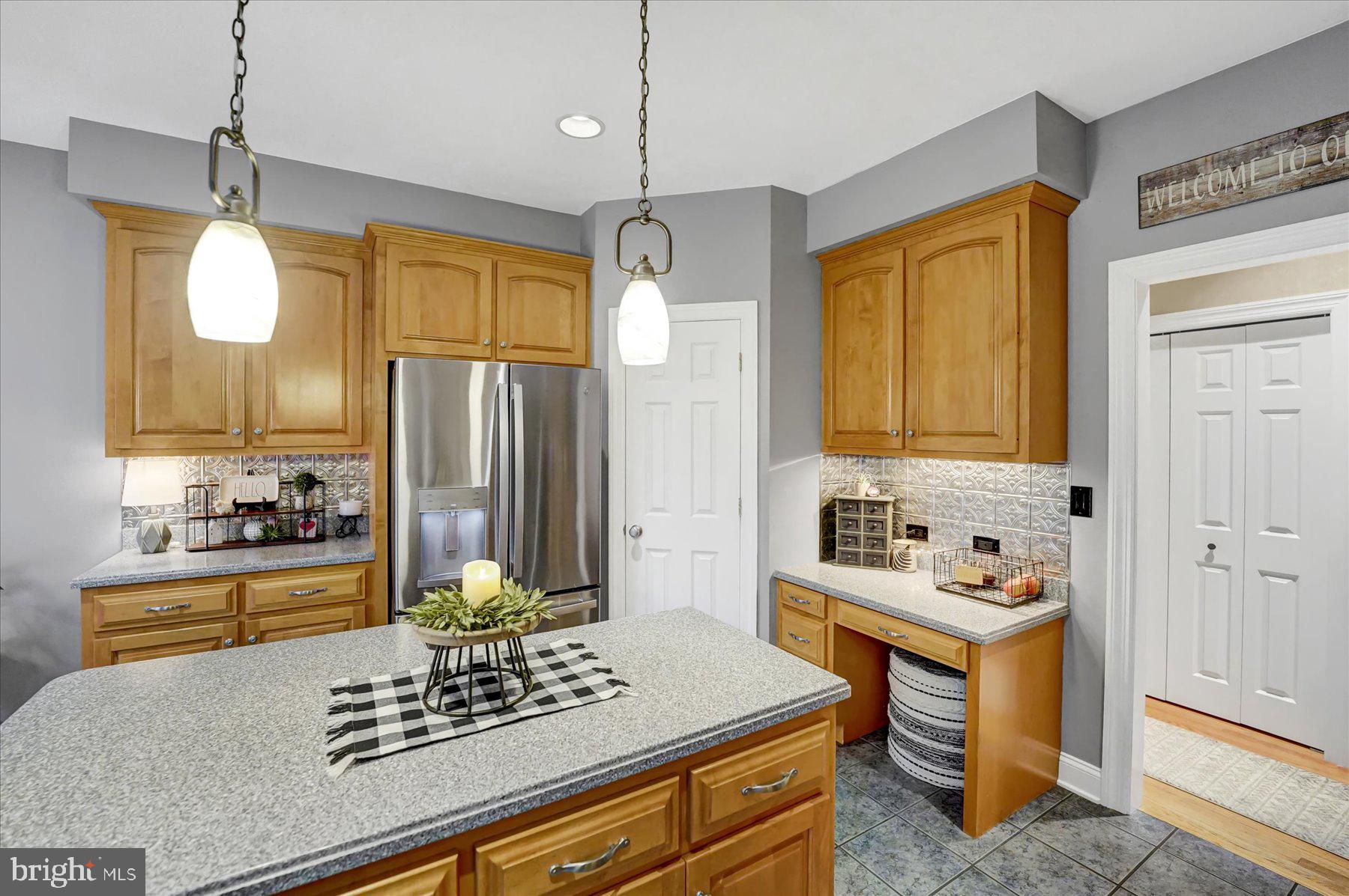 503 Robin Road Bellefonte, PA 16823 - Photo 18 of 72 a kitchen with a refrigerator a stove and a sink