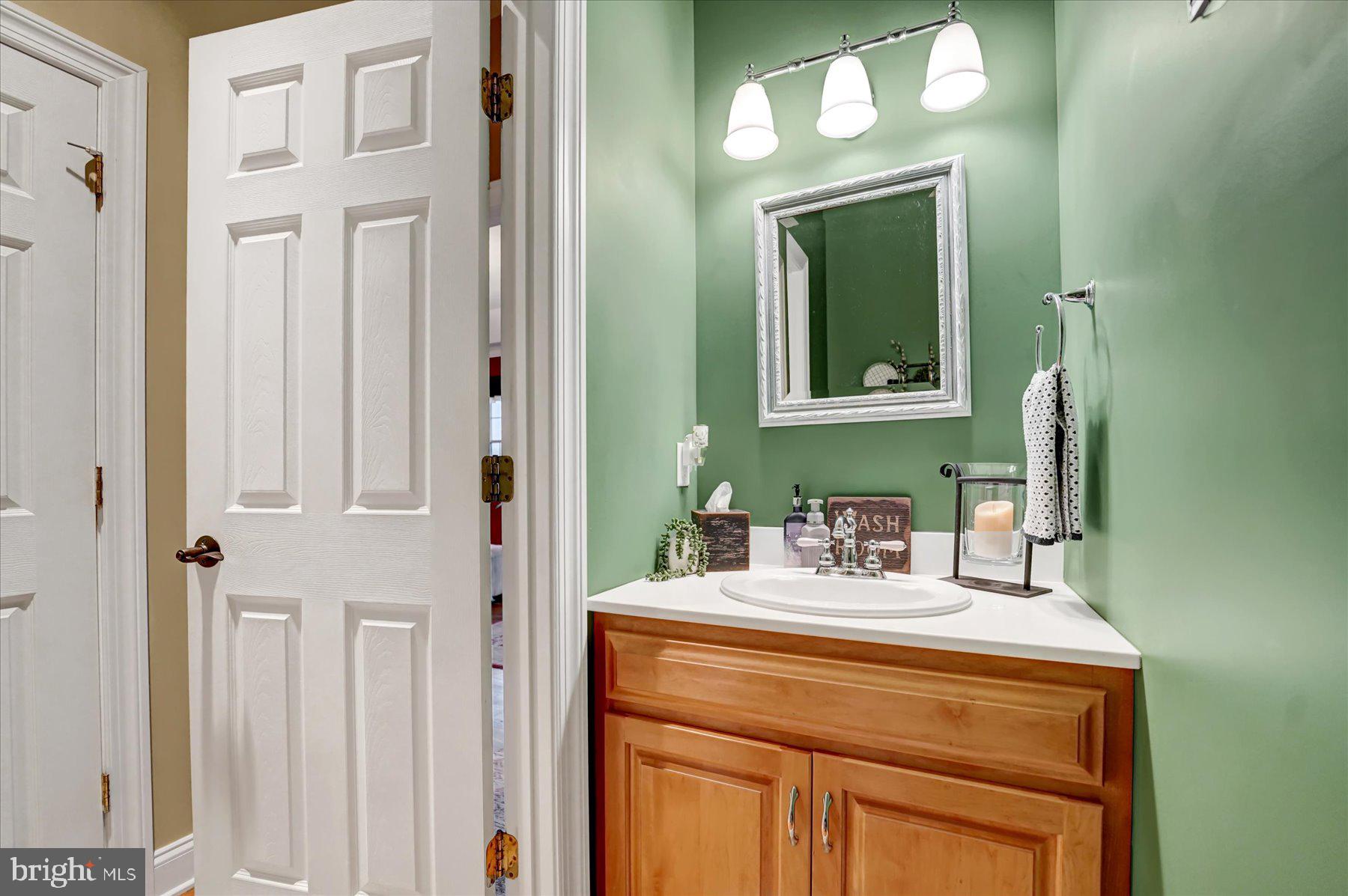 503 Robin Road Bellefonte, PA 16823 - Photo 25 of 72 a bathroom with a sink vanity and a mirror