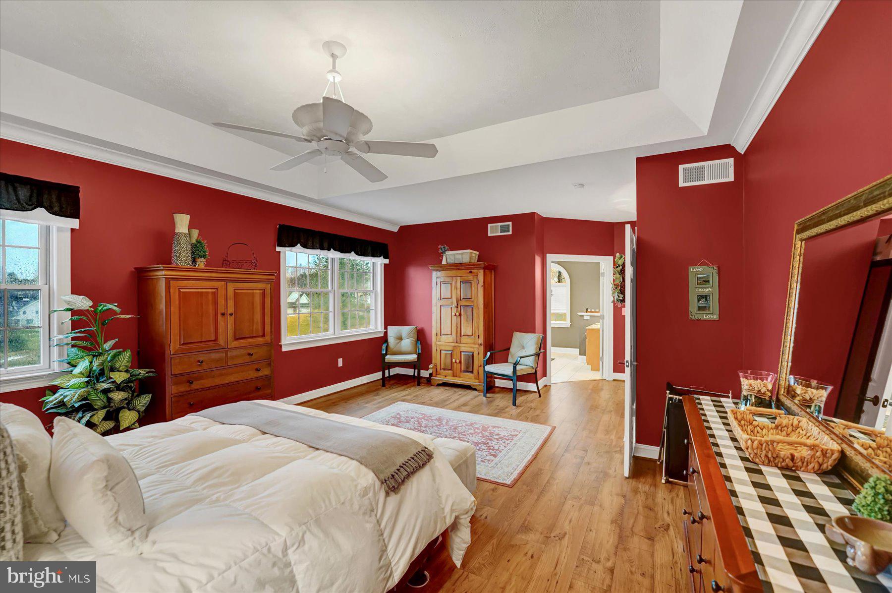 503 Robin Road Bellefonte, PA 16823 - Photo 29 of 72 a bedroom with a bed dresser and a large window