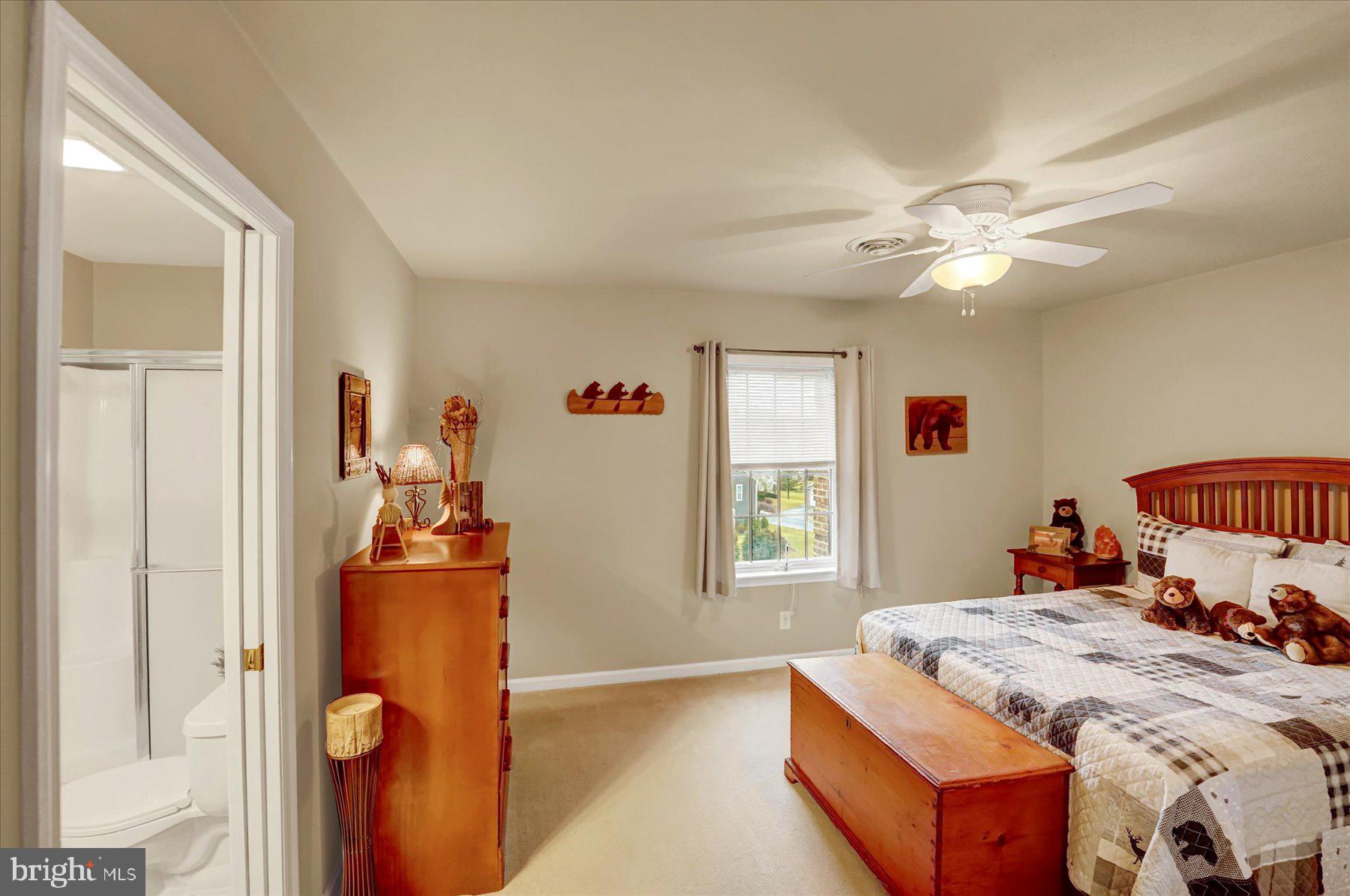 503 Robin Road Bellefonte, PA 16823 - Photo 36 of 72 a bed room with a bed and a chandelier