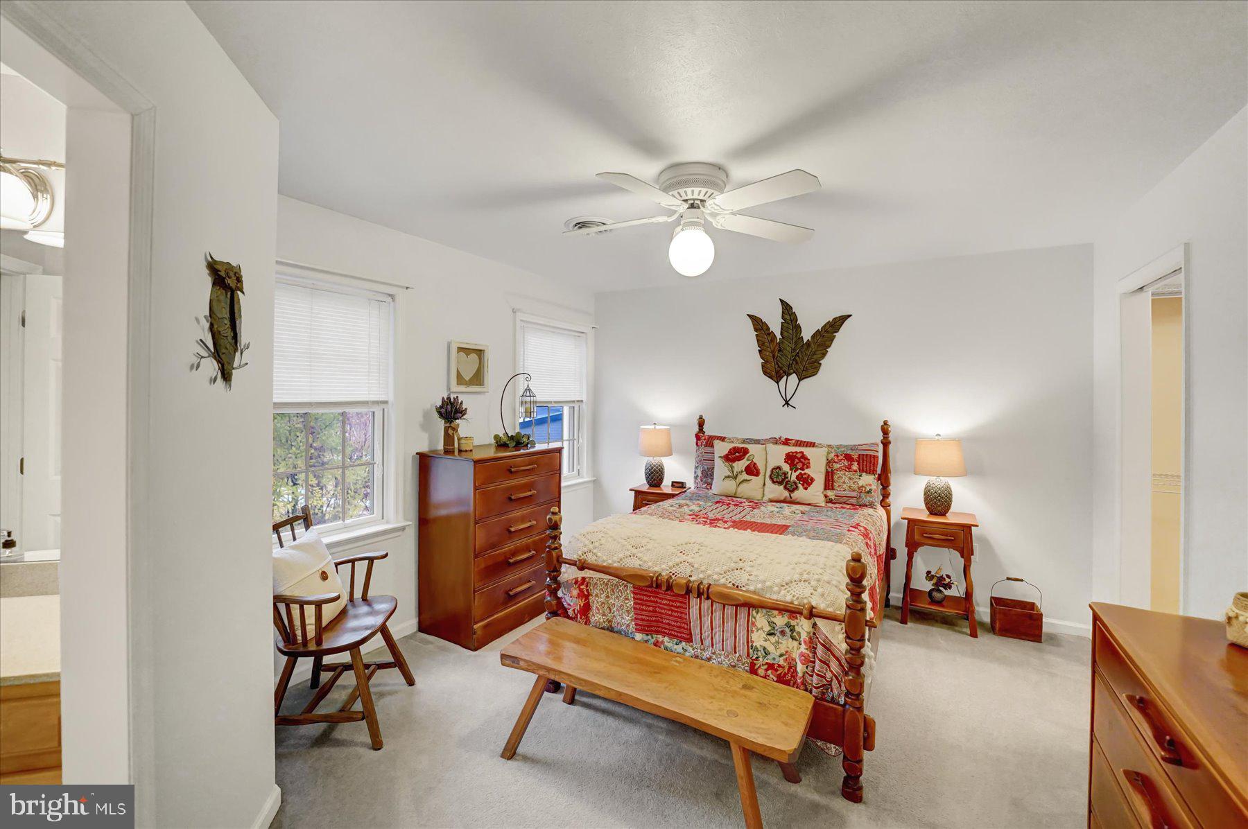 503 Robin Road Bellefonte, PA 16823 - Photo 42 of 72 a bedroom with a bed and a chandelier