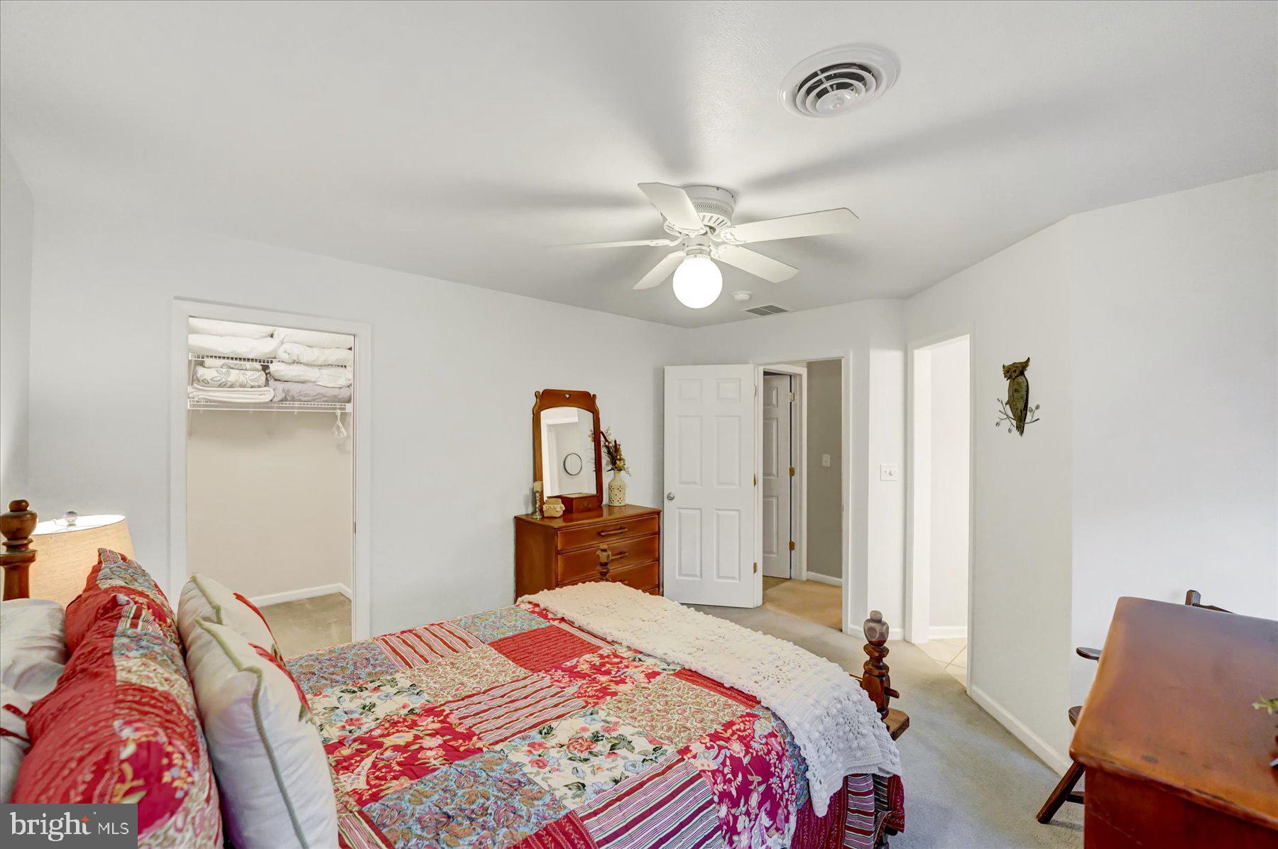503 Robin Road Bellefonte, PA 16823 - Photo 43 of 72 a bedroom with a bed and a chandelier