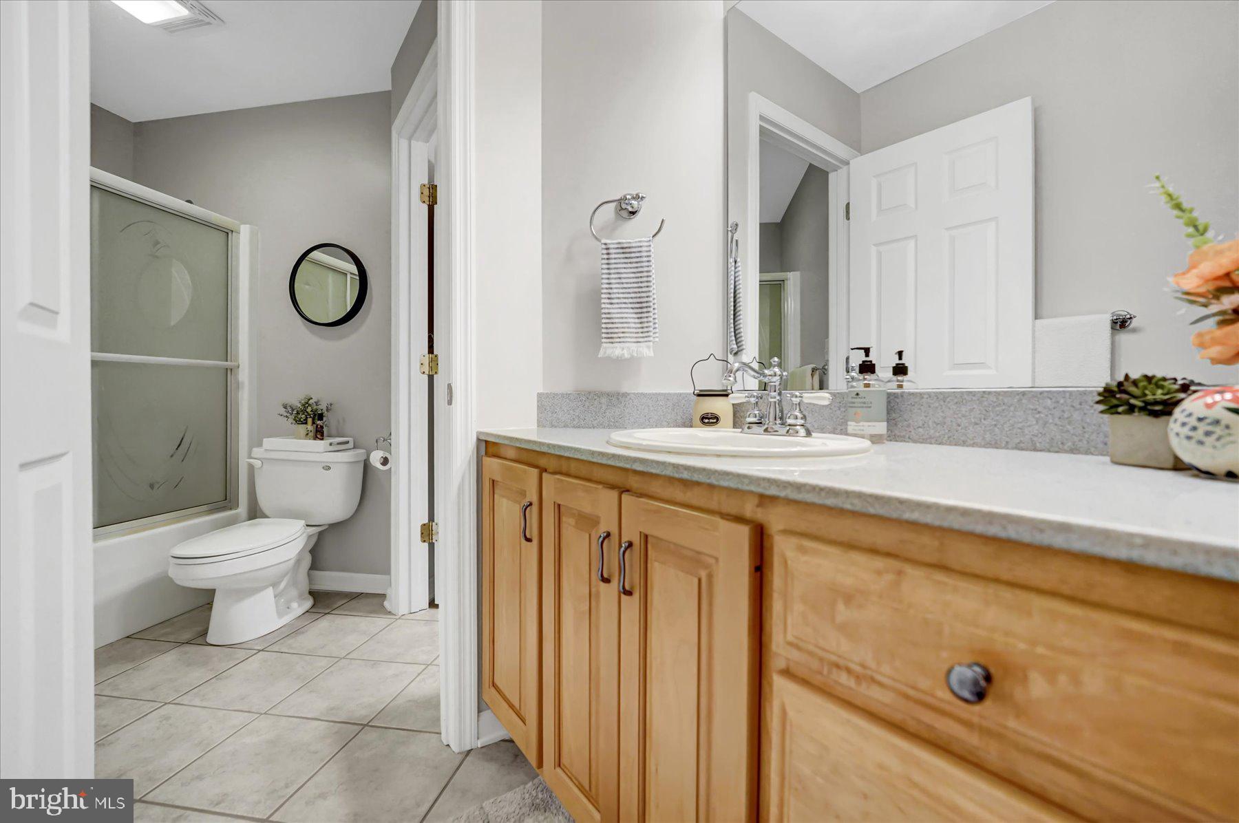 503 Robin Road Bellefonte, PA 16823 - Photo 44 of 72 a bathroom with a sink a toilet and a mirror