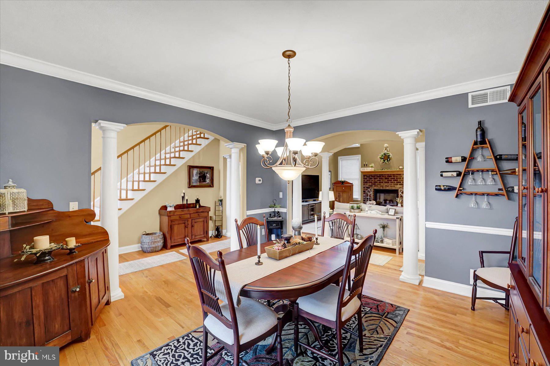 503 Robin Road Bellefonte, PA 16823 - Photo 10 of 72 a dining room with furniture a chandelier and wooden floor