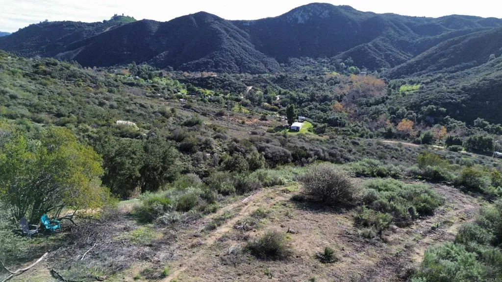 De Luz Murrieta Road Fallbrook, CA 92028 - Photo 4 of 35 a view of a lush green hillside and a houses