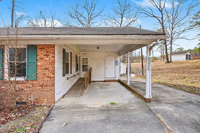 a front view of a house with a porch