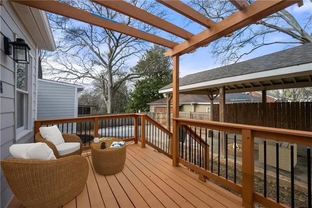 a view of balcony with furniture