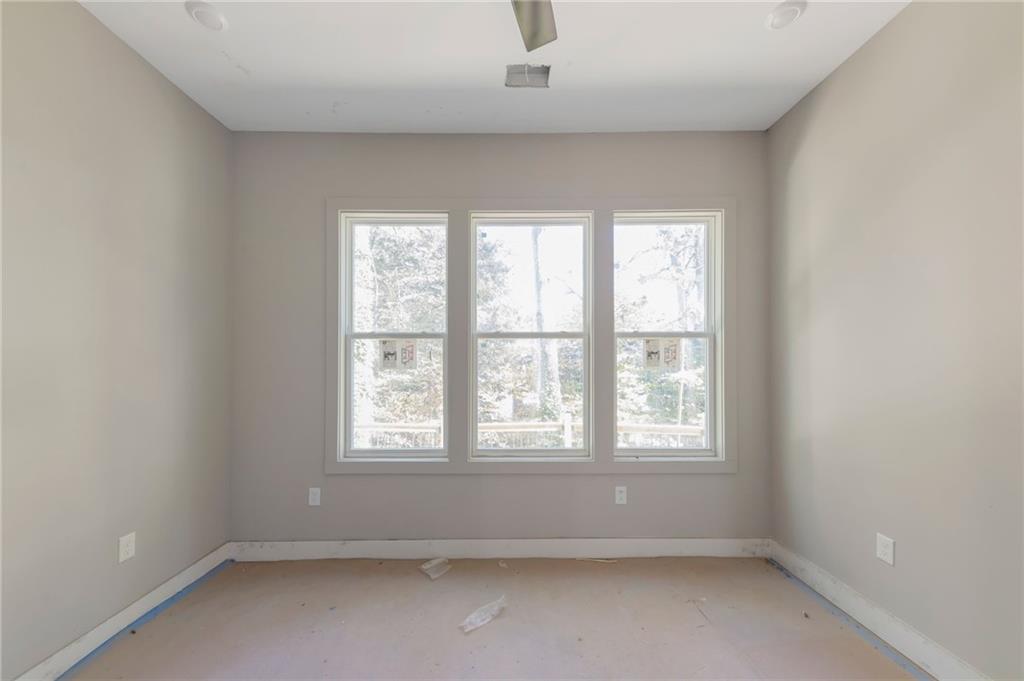 1690 Adams Drive Southwest Atlanta, GA 30311 - Photo 13 of 35 an empty room with a window