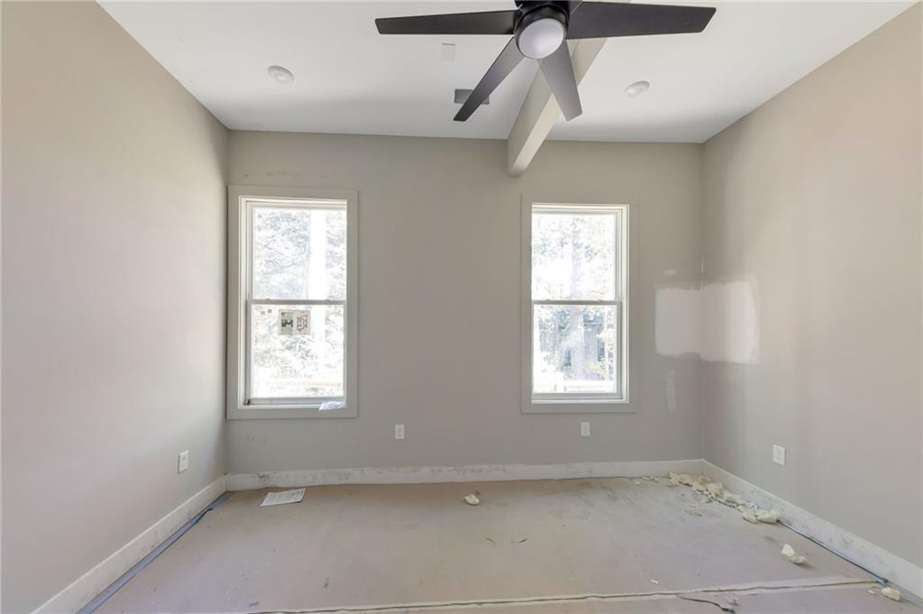 1690 Adams Drive Southwest Atlanta, GA 30311 - Photo 15 of 35 an empty room with windows