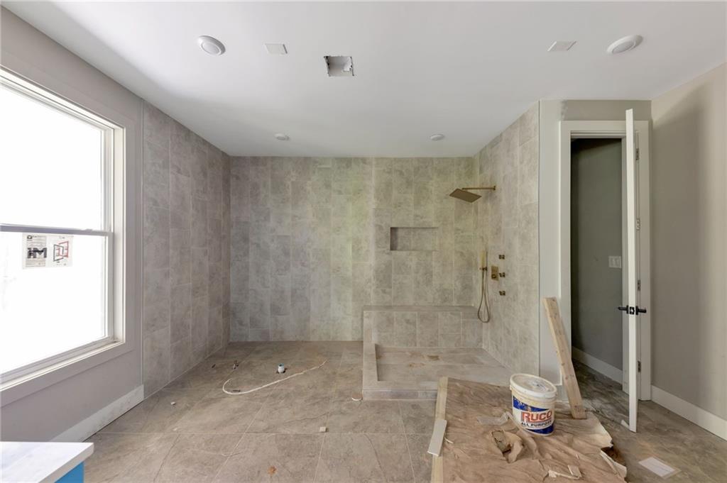 1690 Adams Drive Southwest Atlanta, GA 30311 - Photo 26 of 35 a bathroom with a shower