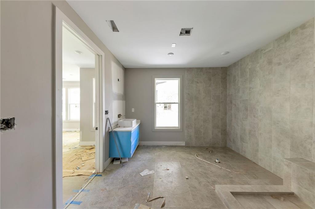 1690 Adams Drive Southwest Atlanta, GA 30311 - Photo 27 of 35 a view of an empty room with a window