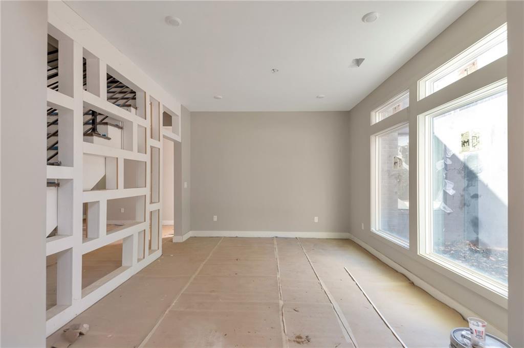 1690 Adams Drive Southwest Atlanta, GA 30311 - Photo 4 of 35 a view of an empty room with a window