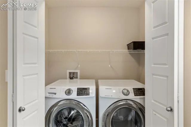 a utility room with dryer and washer
