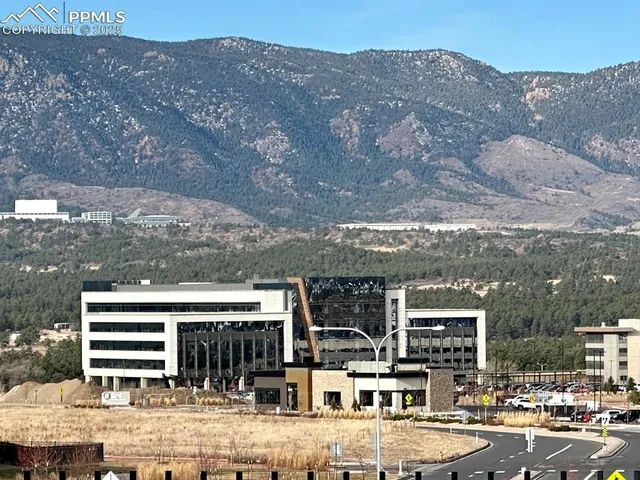 a view of a lake with a yard