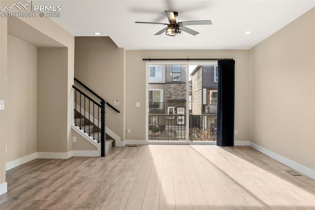 1367 Plentiful Drive Colorado Springs, CO 80921 - Photo 7 of 28 a view of an empty room with a window