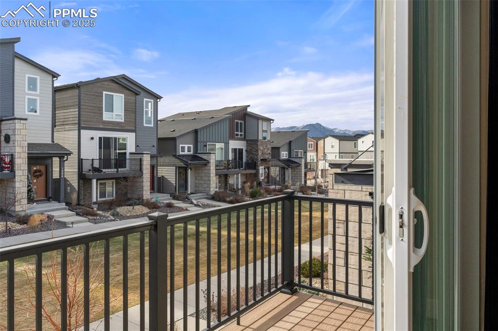 1367 Plentiful Drive Colorado Springs, CO 80921 - Photo 9 of 28 a view of a street from a balcony