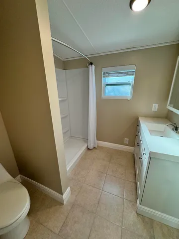 a bathroom with a sink and toilet