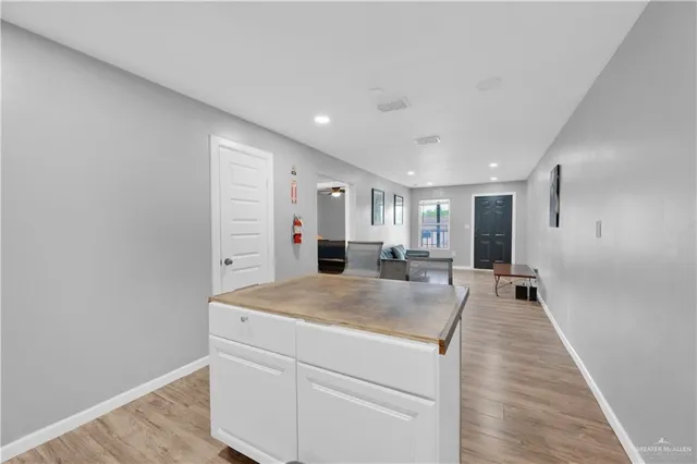 a view of a kitchen with a sink