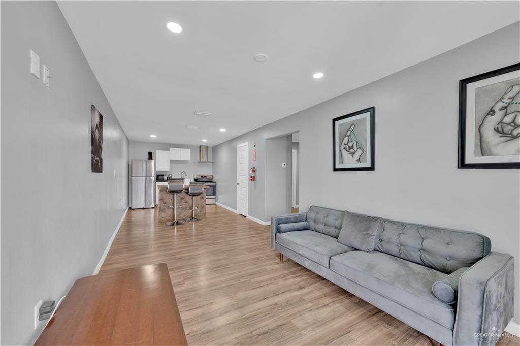405 East Guerra Street Rio Grande City, TX 78582 - Photo 14 of 33 a living room with furniture and a table
