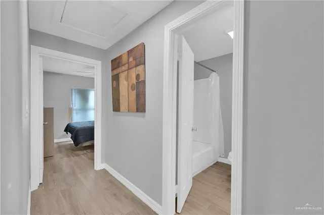 a view of a livingroom from a hallway