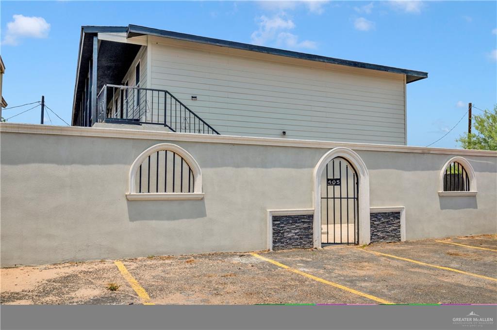 405 East Guerra Street Rio Grande City, TX 78582 - Photo 25 of 33 a view of a brick house with windows