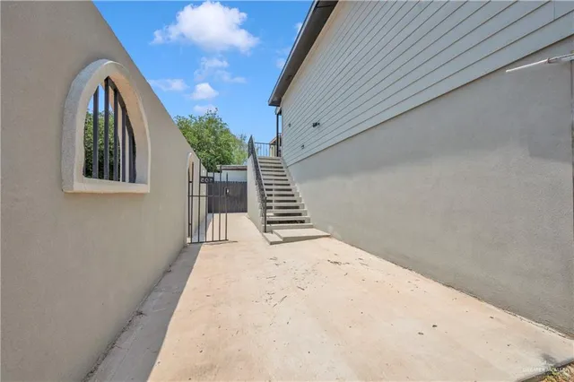 a view of wooden floor in front of a house