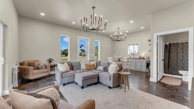 a dining room with furniture and window