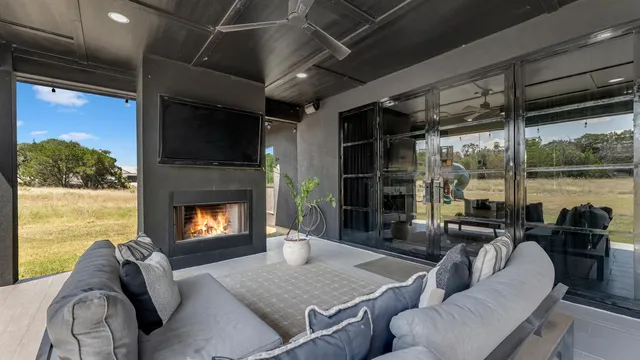 a view of swimming pool with an outdoor space and seating area