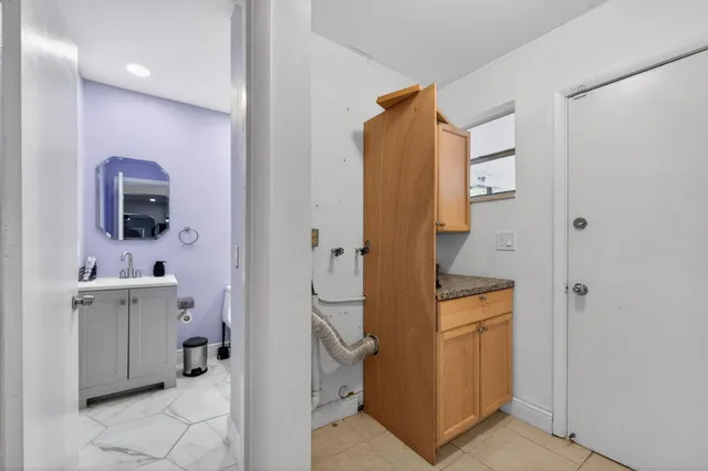 an empty room with a empty space and a ceiling fan