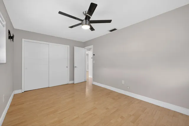 a view of yard with patio