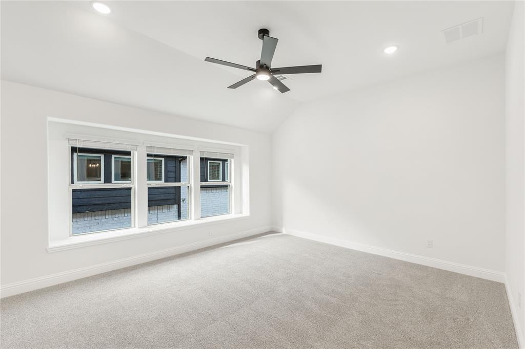 14509 Lovelace Street Pilot Point, TX 76258 - Photo 18 of 35 a view of empty room with ceiling fan