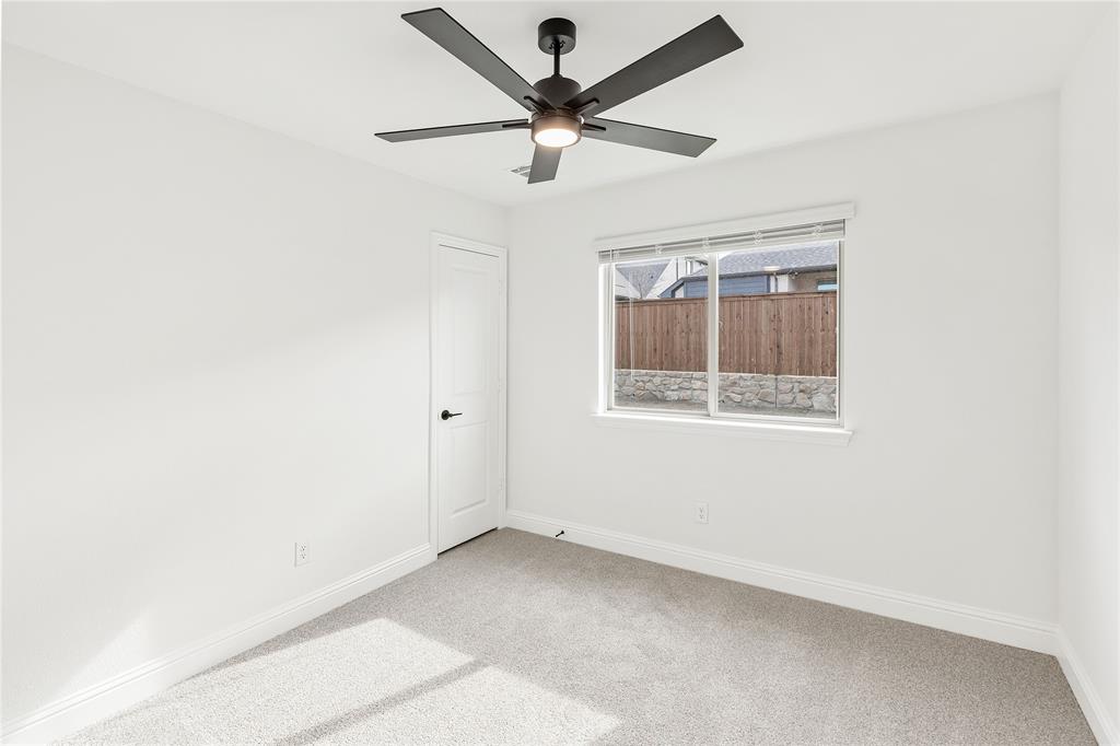 14509 Lovelace Street Pilot Point, TX 76258 - Photo 23 of 35 a view of room with a ceiling fan