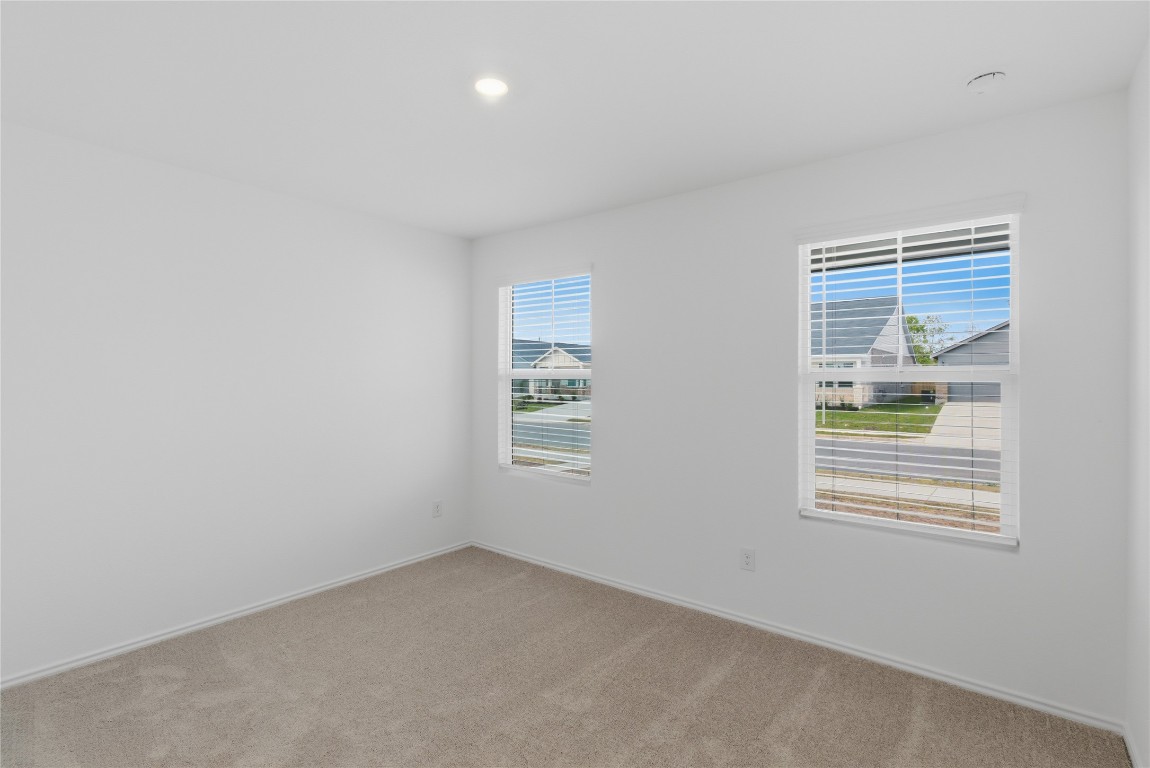596 Sormonne Loop Kyle, TX 78640 - Photo 10 of 25 an empty room with a window