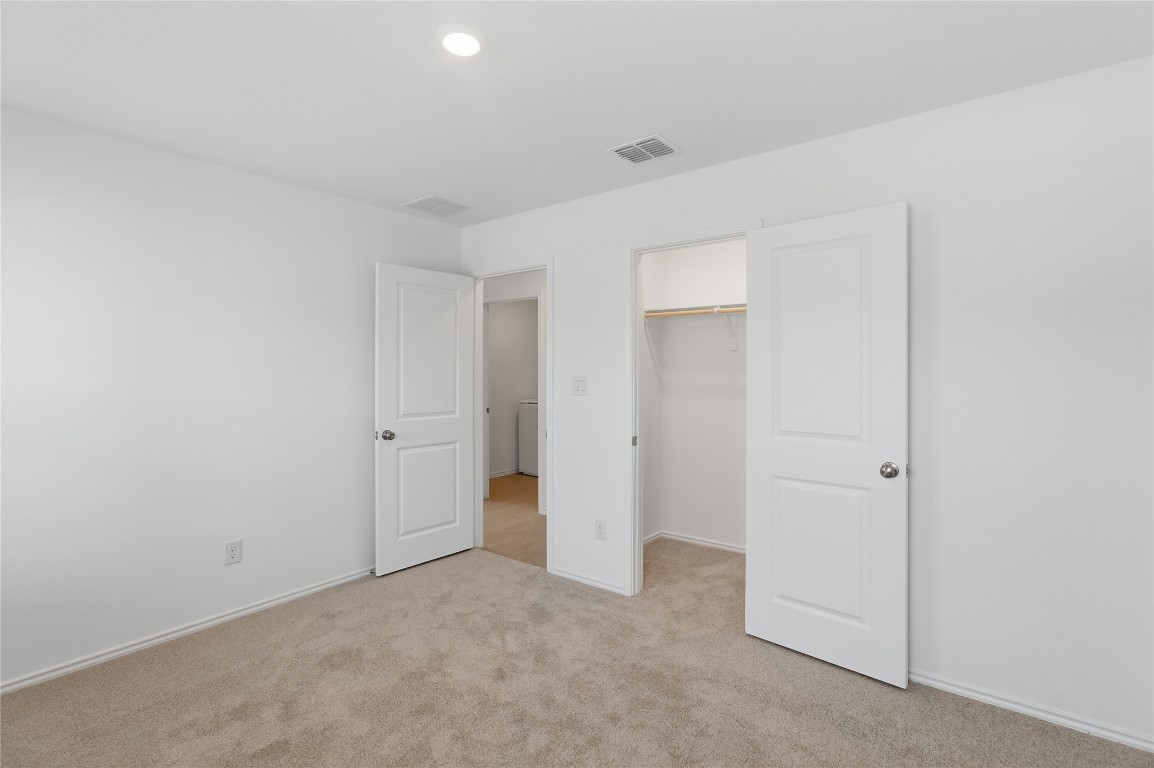 596 Sormonne Loop Kyle, TX 78640 - Photo 11 of 25 a view of an empty room