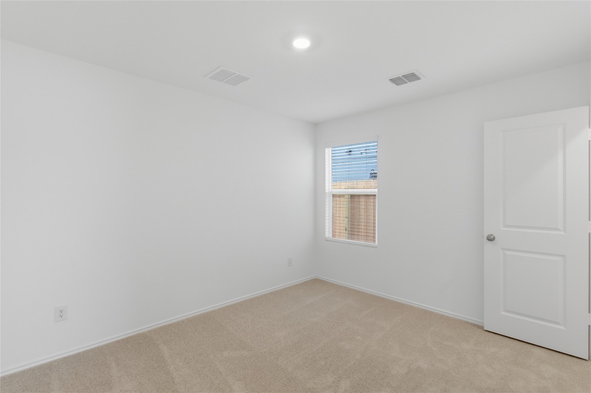 596 Sormonne Loop Kyle, TX 78640 - Photo 12 of 25 an empty room with a window