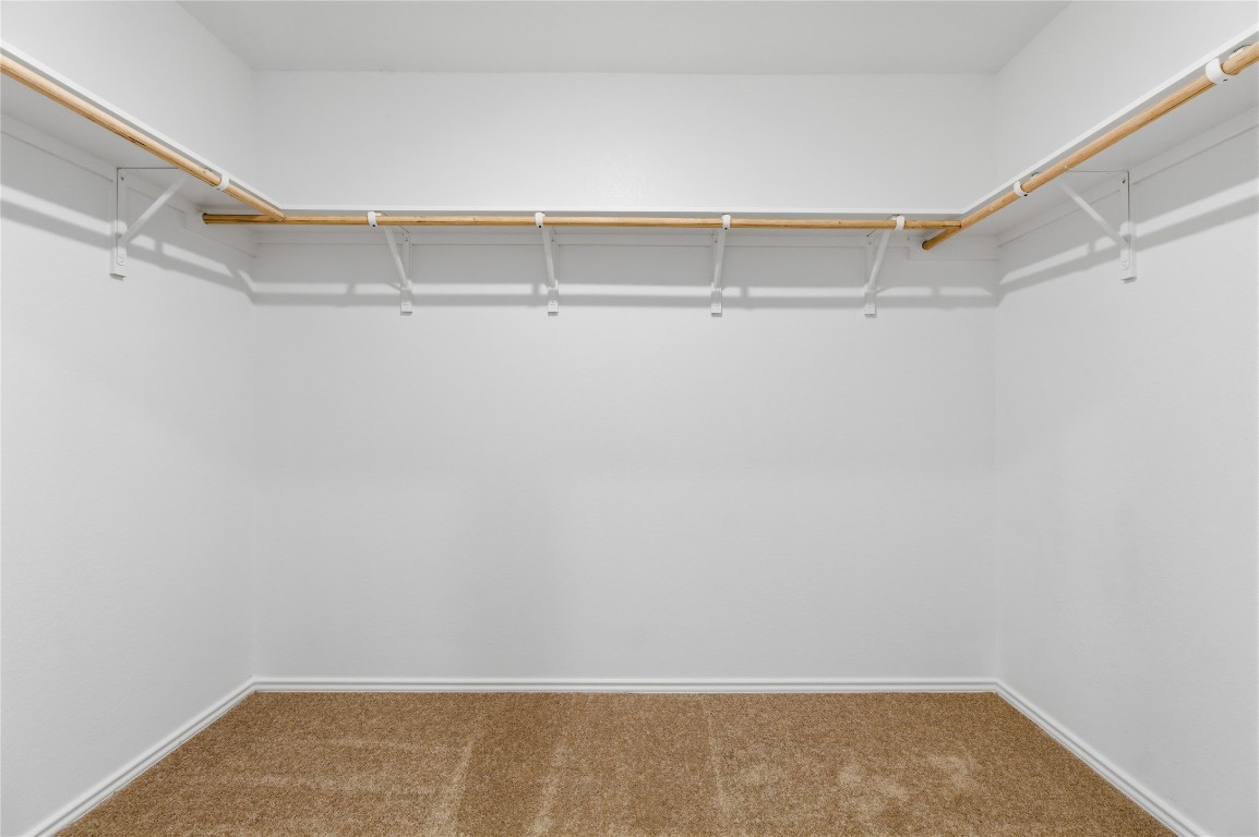 596 Sormonne Loop Kyle, TX 78640 - Photo 16 of 25 a view of an empty walk in closet