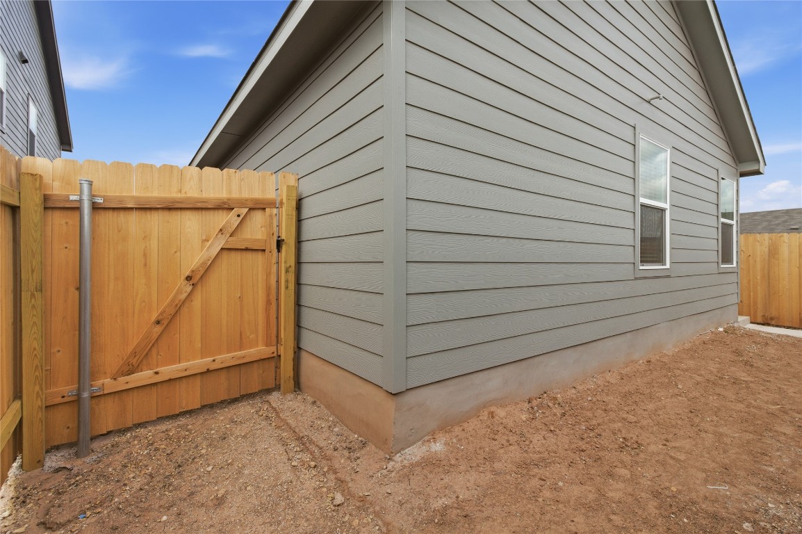 596 Sormonne Loop Kyle, TX 78640 - Photo 17 of 25 a view of a garage