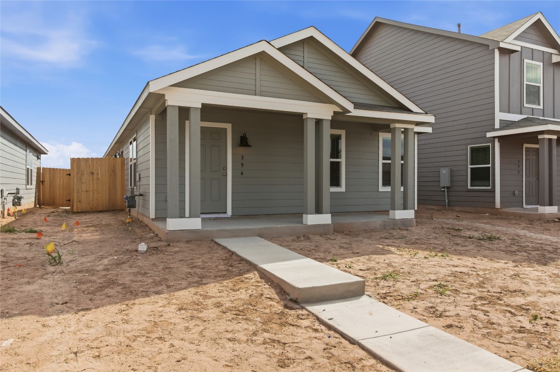 596 Sormonne Loop Kyle, TX 78640 - Photo 22 of 25 a view of a house with a patio