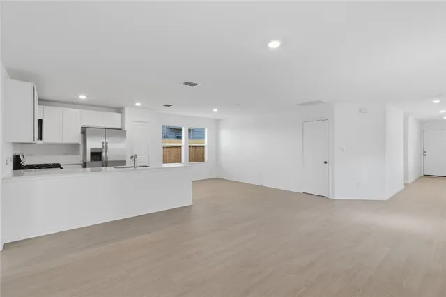 a view of a kitchen with a sink