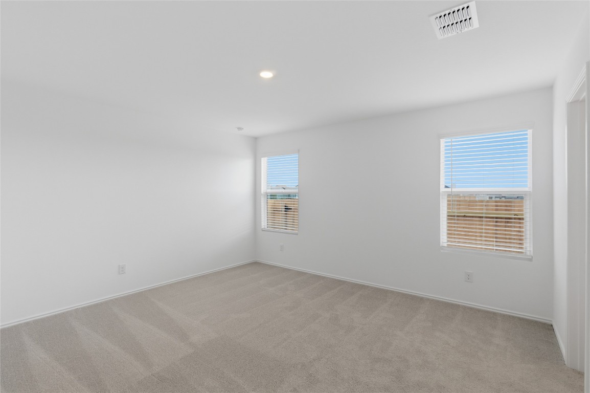 596 Sormonne Loop Kyle, TX 78640 - Photo 8 of 25 an empty room with a window