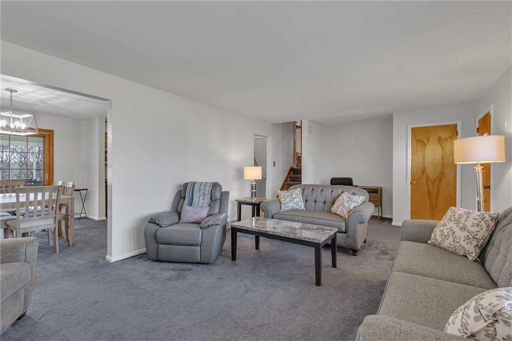 1606 Old Brodhead Road Monaca, PA 15061 - Photo 17 of 37 a living room with furniture and a lamp
