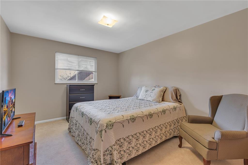 1606 Old Brodhead Road Monaca, PA 15061 - Photo 28 of 37 a bedroom with a bed and a couch