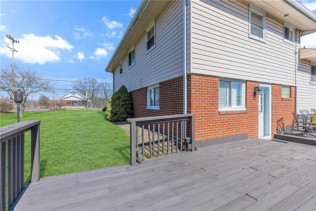 1606 Old Brodhead Road Monaca, PA 15061 - Photo 7 of 37 a view of a house with a yard